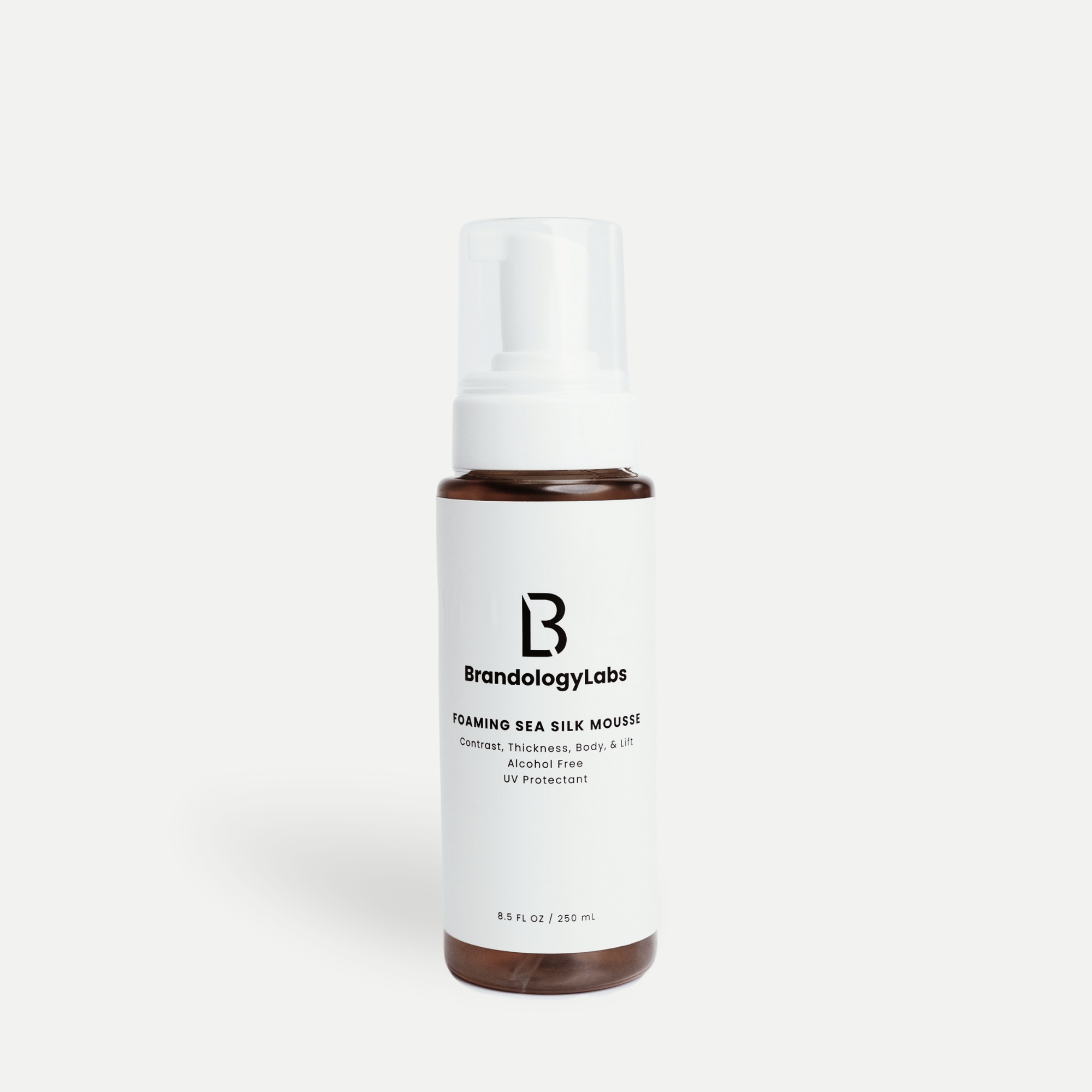 Brandology Labs Volume mousse styling foam for soft body and shine.
