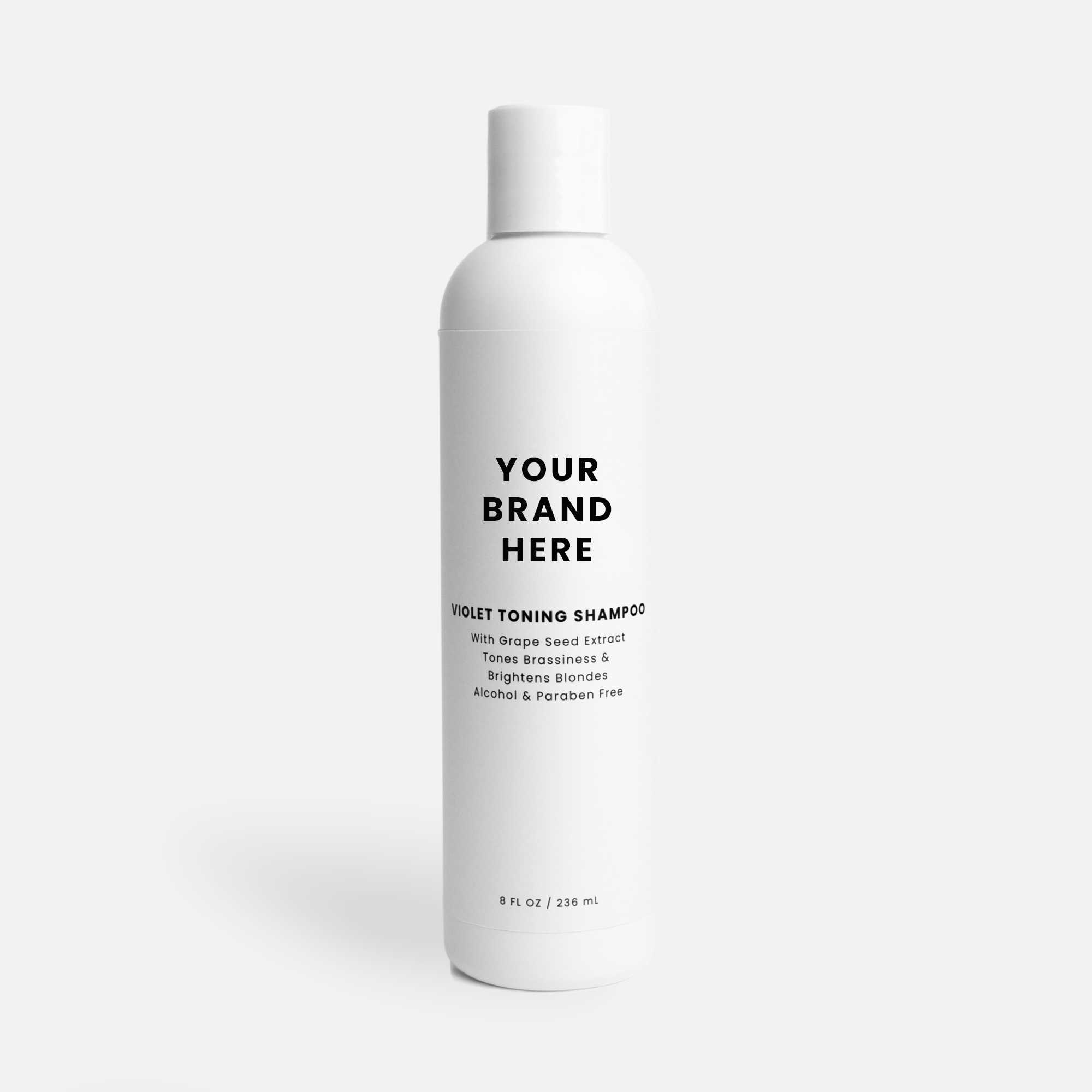 Violet toning shampoo neutralizing brassy tones in blonde hair